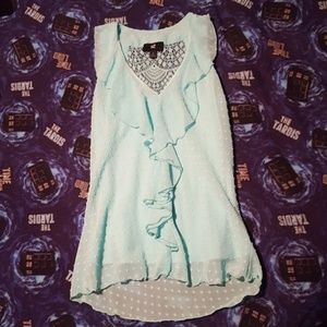 Sleeveless seafoam green blouse